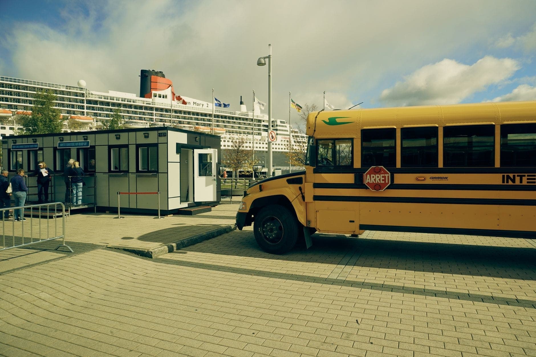 A cruise ship berthed at a passenger terminal, the cruise transfers Maxi Cab Perth handles with luggage space for every passenger
