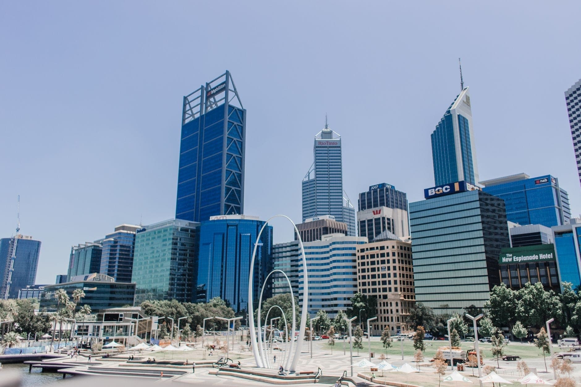 The Perth CBD skyline under clear blue sky, the central pickup area Maxi Cab Perth services 24/7. Maxi Cab Perth runs fixed-fare maxi taxi pickups in Joondalup.